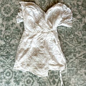 Never been worn white eyelet romper. From boutique
